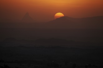 Spectacular sunset at Gheralta Lodge with silhouetted mountains, Hawzien, Tigray, Ethiopia