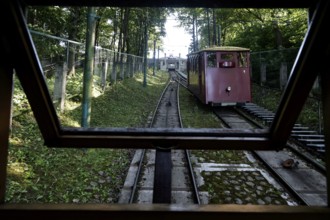 Historic Aleksotas funicular runs through a wooded section in Kaunas, Kaunas, Kaunas, Lithuania