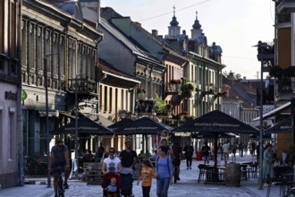 Vivid street scene of Vilnius Gatve in Kaunas with people and historic facades, Kaunas, Kaunas,