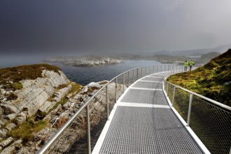 Eldhusøya viewpoint along Atlanterhavsveien with sea views and dramatic clouds, Lauvøyford, Møre og