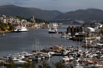 Kirkelandet marina with views of Gomalandet and Nordlandet, surrounded by mountains and water,