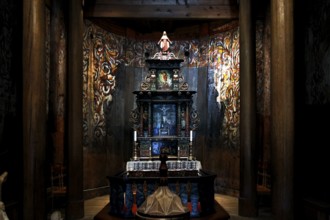 On display altar with ornate carvings in the stave church, Heddal, Norway
