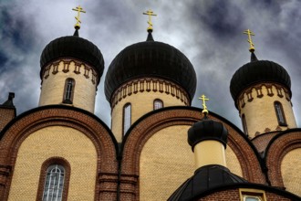 Detail of the main Orthodox church in the Pühtitsa nunnery with distinctive domes, Kuremäe, Estonia