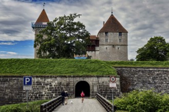 Impressive medieval castle complex with towers and entrance through a stone wall, Kuressaare,