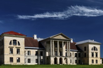 Historic manor house with classic architecture under a clear sky in Kolga, Kolga, Estonia