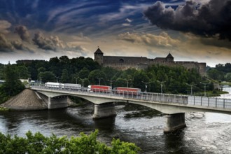 Friendship Bridge crosses the river under a dramatic sky in Narva, Narva, Estonia