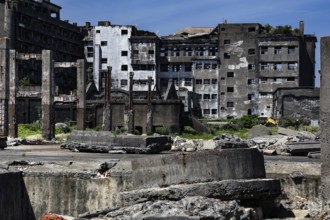 Historic ruins on the northern tip of Gunkanjima, a reminder of past times, Nagasaki, Kyushu, Japan