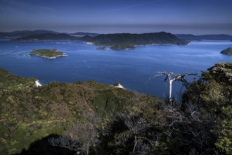 View from Mount Misen of a vast bay with several islands under a blue sky, Miyajima, Hiroshima,