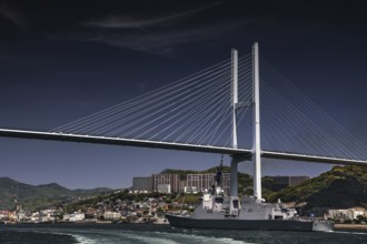 Modern bridge across the sea with a warship and urban background, Nagasaki, Nagasaki, Japan