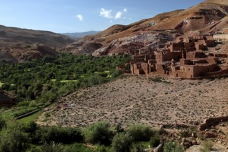 Old village made of earthen buildings in a mountainous area in the Ounilla Valley