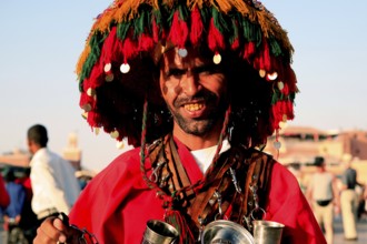 Traditional water seller on the Djemaa El Fna in Marrakech, Marrakech, Marrakesh-Safi, Morocco