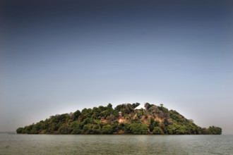 Green island surrounded by the clear water of Lake Tana, Lake Tana, Amhara, Ethiopia
