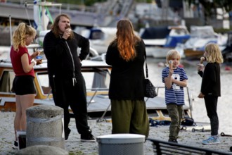 People enjoying ice cream at Porvoo Marina, Porvoo, Finland