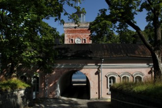 Suomenlinna sea fortress barracks and gate surrounded by trees, Helsinki, Uusimaa, Finland