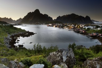 Reine and Hamnøay, surrounded by lakes and the dramatic Lofoten mountains, Reine, Moskenesøy,