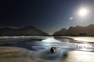 Sunny beach on Flakstadøy with mountains in the background, Flakstad, Lofoten, Norway