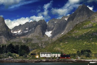 Impressive mountain landscape of Lofoten at Raftsund with distinctive mountain peaks and slightly