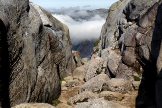 Crevice during the descent from Kjerag in a cloudy landscape, Lysefjord, Rogaland, Norway
