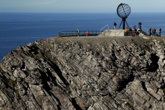 Panorama of cliffs at the North Cape with the globe and sea in the background, North Cape,