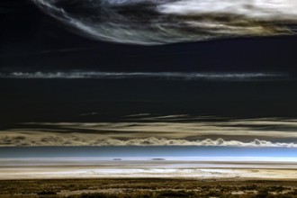 Lake Eyre in Australia with dramatic clouds and vast desert landscape, Lake Eyre, South Australia,