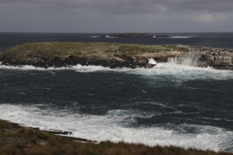 Dramatic coastal scene with turbulent seas and stormy sky near Cape du Couedic, Kangaroo Island,