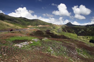 Extensive mountain landscape under blue sky with clouds in Bale Mountains National Park, Bale