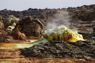 Vivid geothermal scene in Dallol with steaming sulfur-rich formations, Dallol, Afar region,