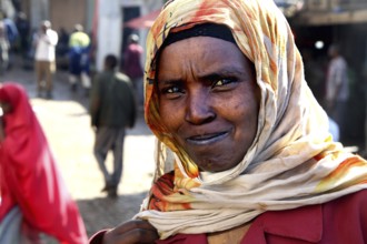 Portrait of a woman wearing traditional clothing at a market in Awaday, Awaday, Afar, Ethiopia