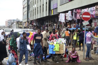 Diverse market life on the Mercato in Addis Ababa with colorful clothes and stalls, Addis Ababa,