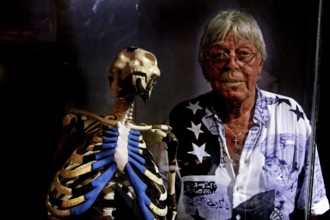 Person next to the famous Lucy skeleton in the National Museum of Addis Ababa, Addis Ababa,