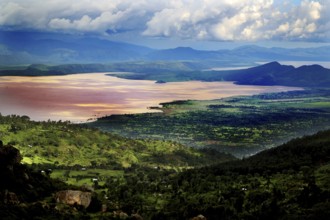 Panorama of Lake Chamo with surrounding green hills and dramatic cloud formations, Lake Chamo,