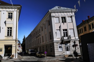 The Leaning House in the old town of Tartu shows distinctive architectural styles and clear blue
