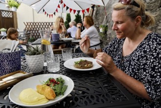 Cosy outdoor dining at Moon Restaurant with a relaxed atmosphere, Tallinn, Kelmiküla, Estonia