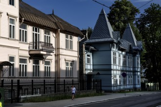 Traditional wooden houses in Kadriorg Tallinn surrounded by green trees, Tallinn, Harju, Estonia