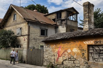 Various wooden houses decorated with graffiti in Kelmiküla Tallinn, Tallinn, Harju, Estonia