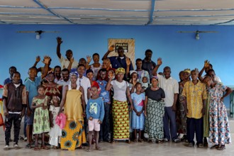 Large group at the outpatient ward for the mentally ill, showing community and support, Mbahiakro,