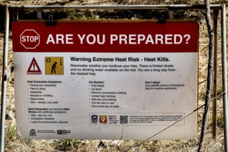 Warning sign in Bell Gorge warning of extreme heat and safety measures, Bell Gorge, Australia