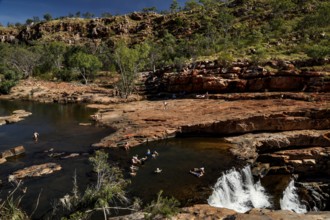 Bell Gorge with impressive waterfall and surrounding rocks and vegetation in Australia, zero