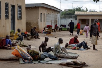 Patients in an open courtyard as part of their daily routines in Bouaké, Bouaké, Saint Camille,