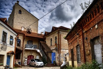 Courtyard view with old brick building and art studio in Vilnius' Užupis district, Vilnius, Užupis,