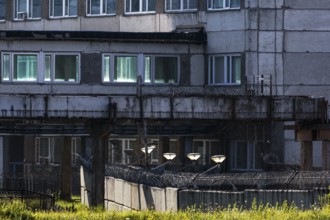 Detailed view of part of a building of a disused power plant with windows, Visaginas, Lithuania