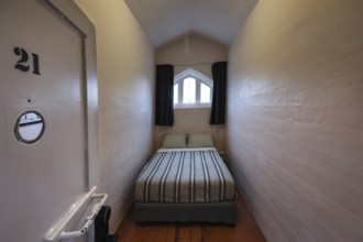 Simple cell as accommodation in the former prison in Christchurch, Christchurch, Canterbury, New