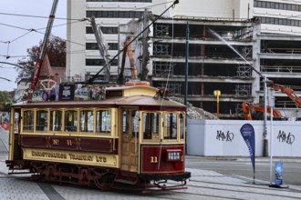 Historic tram in front of damaged buildings in Christchurch, Christchurch, Canterbury, New Zealand