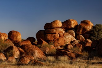 Dense collection of impressive rocks under bright blue sky, Devil's Marbles, Northern Territory,