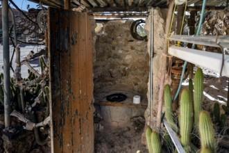 Simple toilet made from natural materials in Crocodile Harry's Dugout, Coober Pedy, South