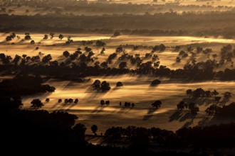 Evening landscape view of Boroka Lookout in the Grampian Mountains with illuminated fields and