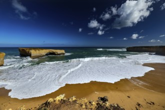 The London Bridge coastal formation on the Great Ocean Road with impressive rocks and waves, Great