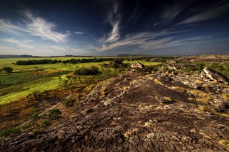 Rugged landscape under dramatic skies from Nardab Lookout in Ubirr, Kakadu National Park, Ubirr,