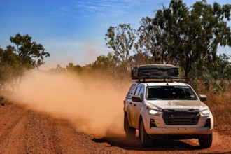 Dusty off-road vehicle on Gibb River Road, Gibb River Road, Western Australia, Australia