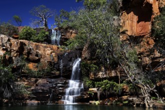 Impressive waterfall amidst pristine rocky landscape of Galvans Gorge, Galvans Gorge, Kimberley,